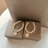 Dusklight Shimmer - Classic Pearl Cat Necklace